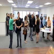 Our upstairs showroom filled with guests for our Grand Opening