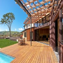 Garapa Deck with picturesque hills in the background.