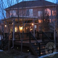 Even at night, this homeowner can entertain guests and family due to its deck lighting.