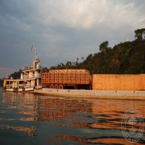 Ipe wood decking being loaded onto a barge.