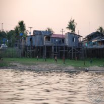 Local children playing futbol. Notice how the homes are propped up. This is because during the rainy season, the water will rise as high as the homes themselves!